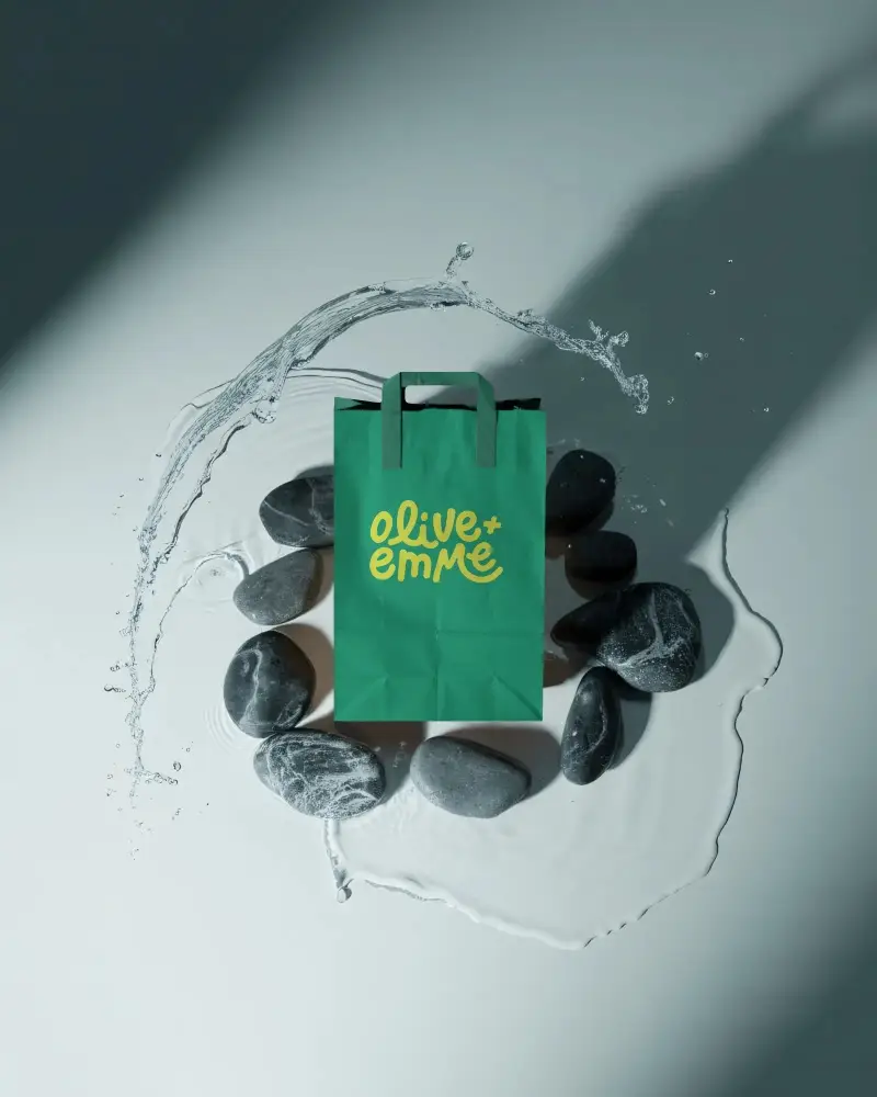 Eco Friendly Paper Bag Mockup With Water Splash And Natural Stone Background For Branding