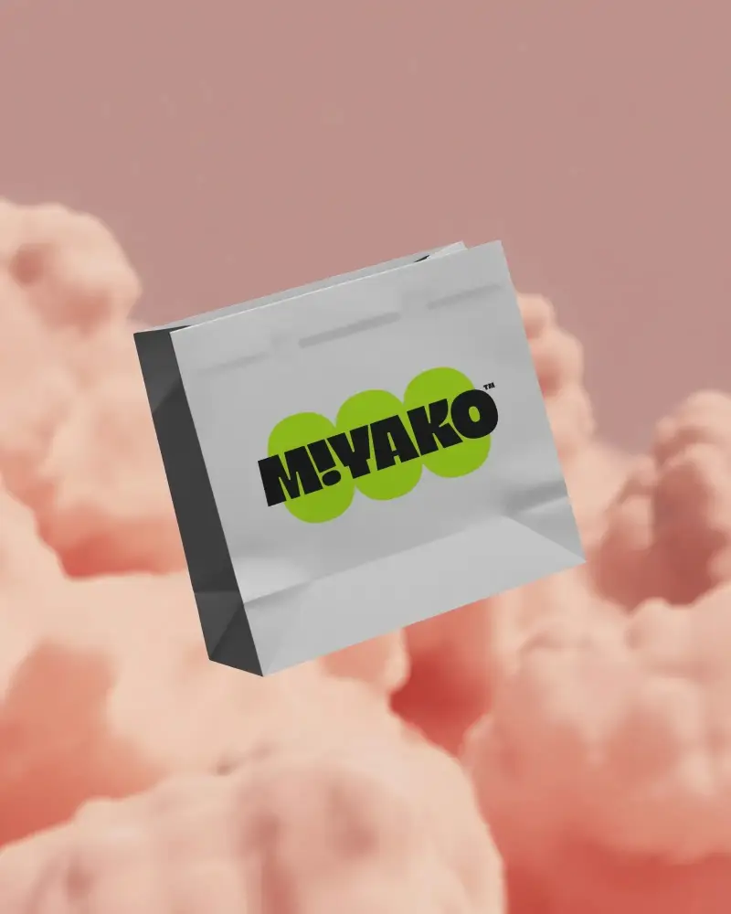 Eco Friendly Paper Bag Mockup Floating Against Soft Cloud Background For Branding