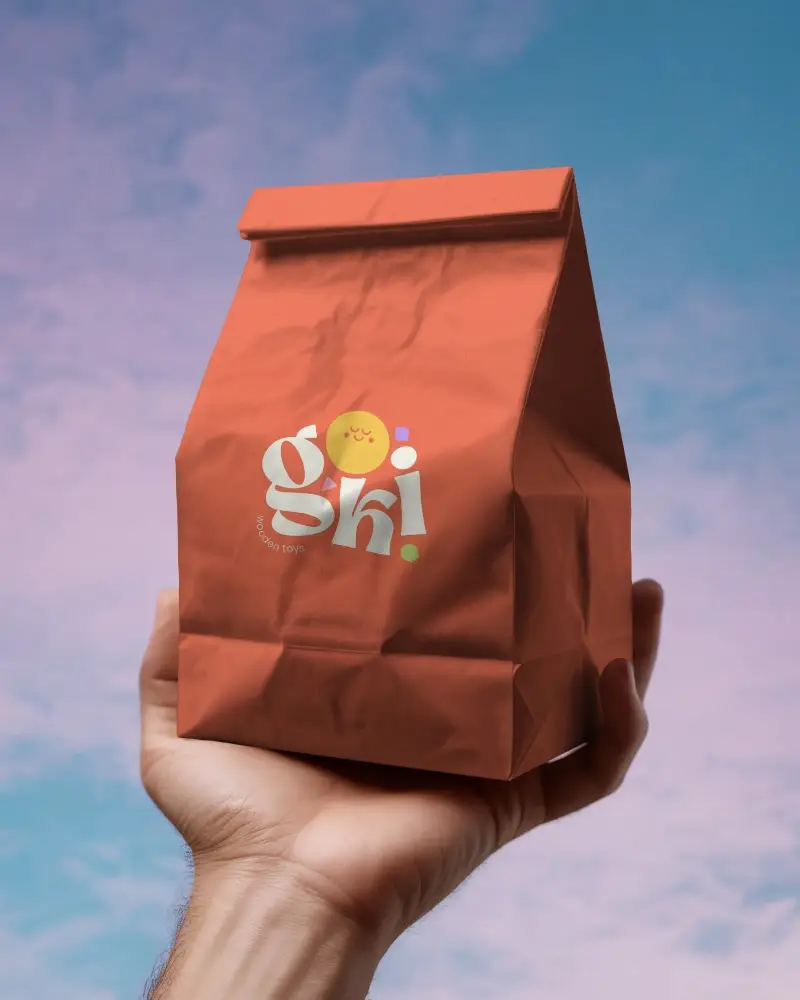 Eco Friendly Paper Bag Mockup Showcasing Flat Bottom Design And Sealable Top Flap