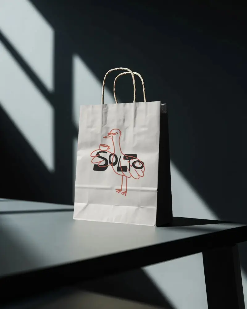 Minimalistic Shopping Paper Bag Mockup With Sturdy Twisted Rope Handles For Custom Printing