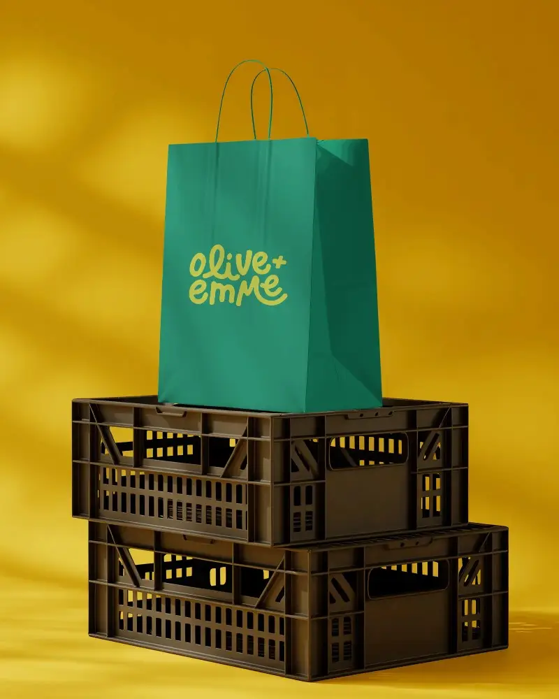 Vertical Paper Bag Mockup On Stacked Storage Crates For Branding And Packaging Design