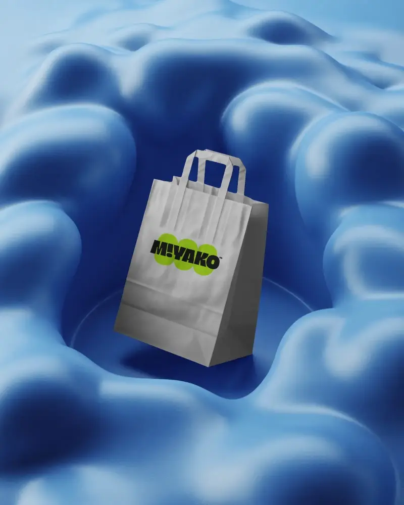 Blank Paper Bag Mockup With Flat Handle Sitting On Round Abstract Textured Background