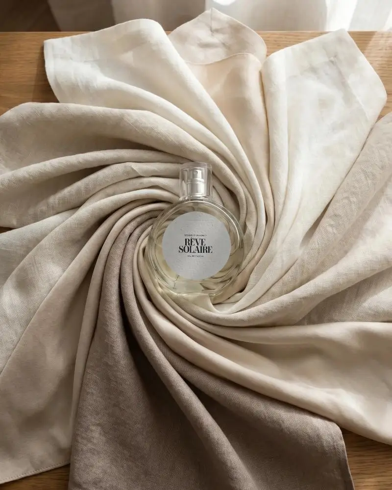 Elegant Perfume Mockup With Soft Fabric Background For Fragrance Design