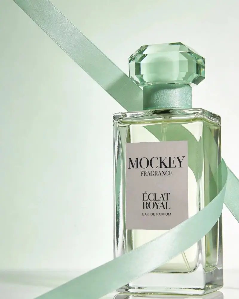 Modern Elegant Perfume Bottle Mockup With Crystal Cap And Stylish Fabric Ribbon Decoration