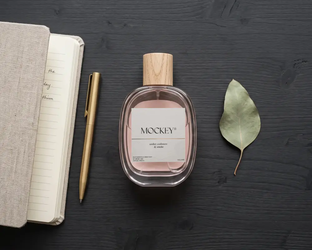 Natural Wooden Cap Perfume Bottle Mockup With Minimalist Label And Organic Leaf Arrangement