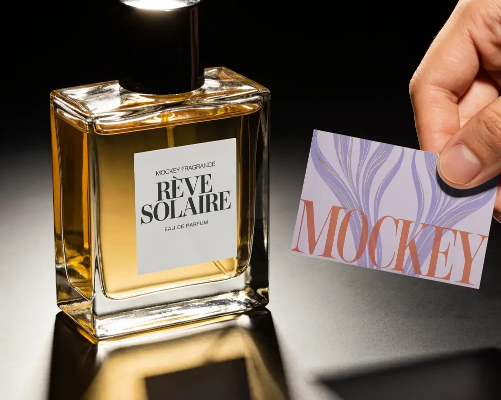 Luxury Perfume Bottle Mockup With Blank Label And Hand Holding Empty Tag