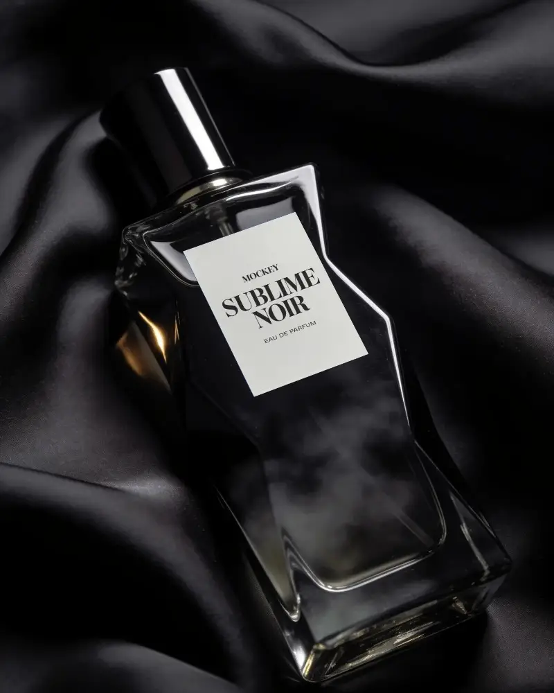 Luxury Perfume Bottle Mockup On Sleek Satin Fabric For Elegant Fragrance Branding
