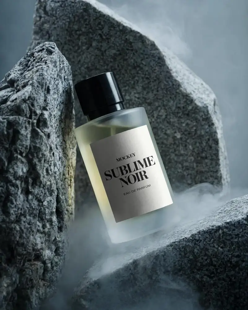Premium Elegant Perfume Bottle Mockup Surrounded By Textured Rocks And Soft Morning Mist