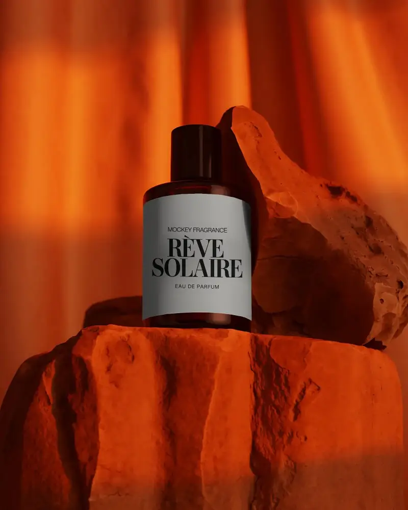 Dark Minimalist Perfume Bottle Mockup On Rough Stone Background For Luxury Fragrance Display