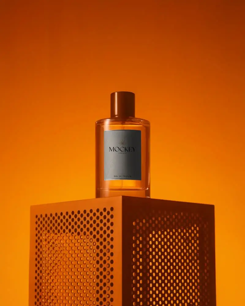 Luxury Perfume Bottle Mockup On Textured Stand For Brand Promotion And Marketing