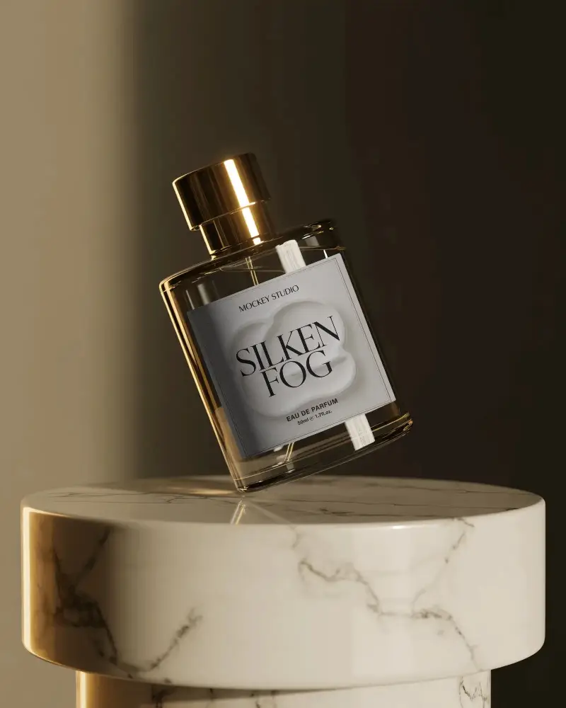 Luxury Perfume Bottle Mockup Tilted Glass Design With Golden Cap On Marble Pedestal Premium Scene