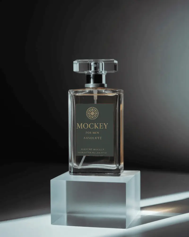 Luxury Glass Perfume Bottle Mockup Transparent Rectangular Bottle On Ice Clear Podium Under Spotlight