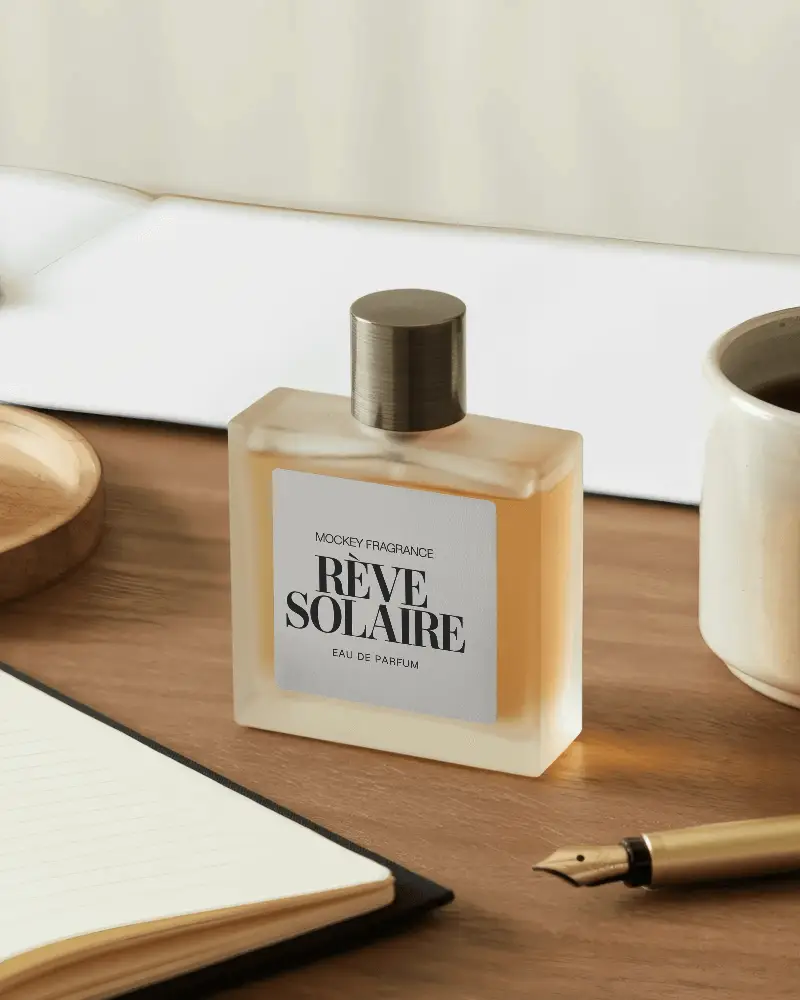 Realistic Perfume Bottle Mockup On Office Desk With Paper Pad And Stationery Stylish Product Display Scene