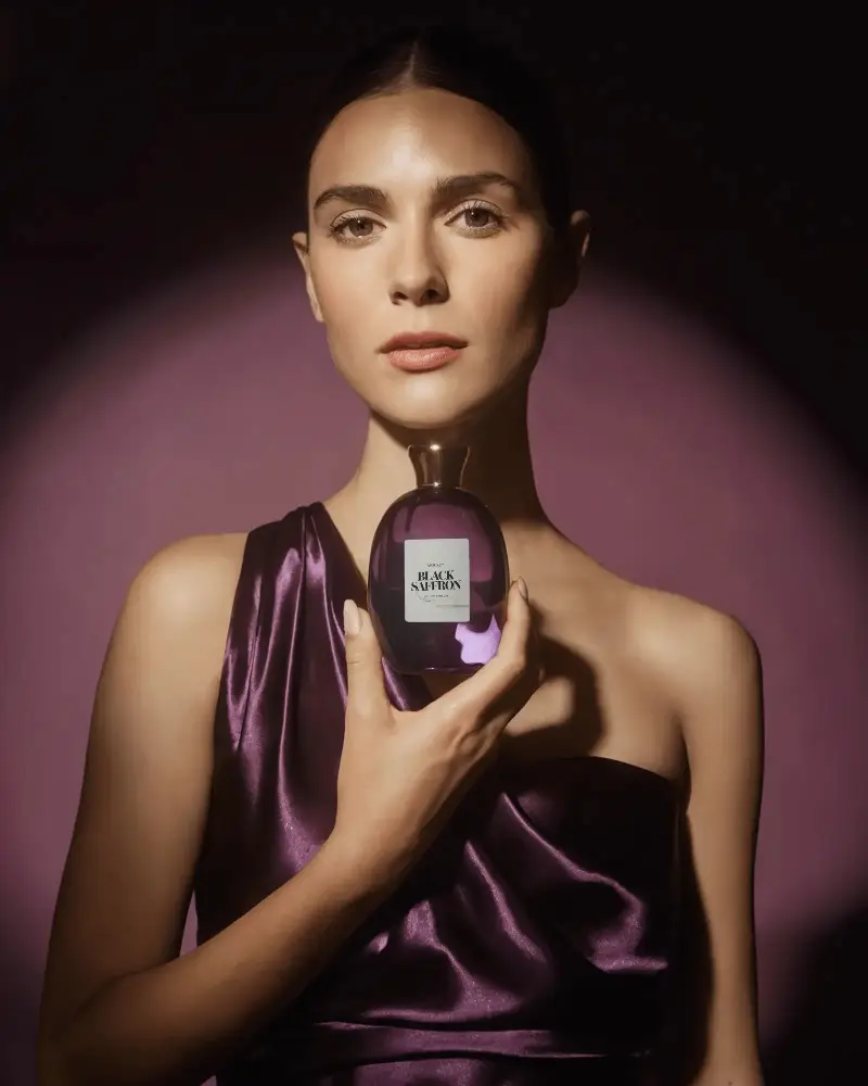 Elegant Perfume Bottle Mockup With Luxurious Fabric And Soft Light For Brand Presentation