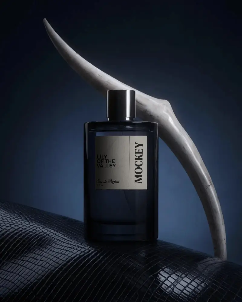 Elegant Mens Perfume Bottle Mockup On Textured Surface With Minimalist Design Background