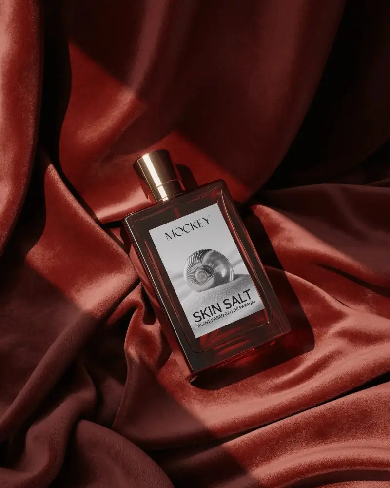 luxury-red-glass-perfume-mockup-on-satin-fabric-soft-lighting-premium-product-display