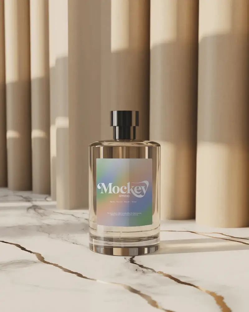 elegant-glass-perfume-bottle-mockup-on-marble-surface-luxury-light-and-shadow-effect