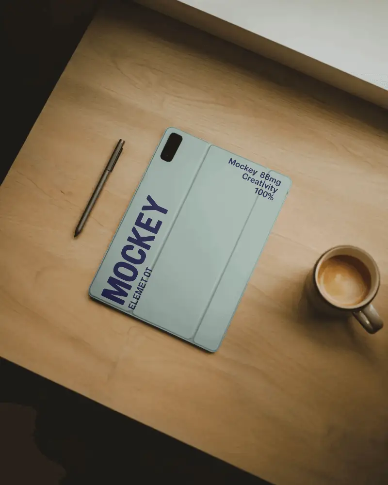 sleek-durable-tab-cover-mockup-on-wooden-surface-with-stylus-and-coffee-cup-accessories