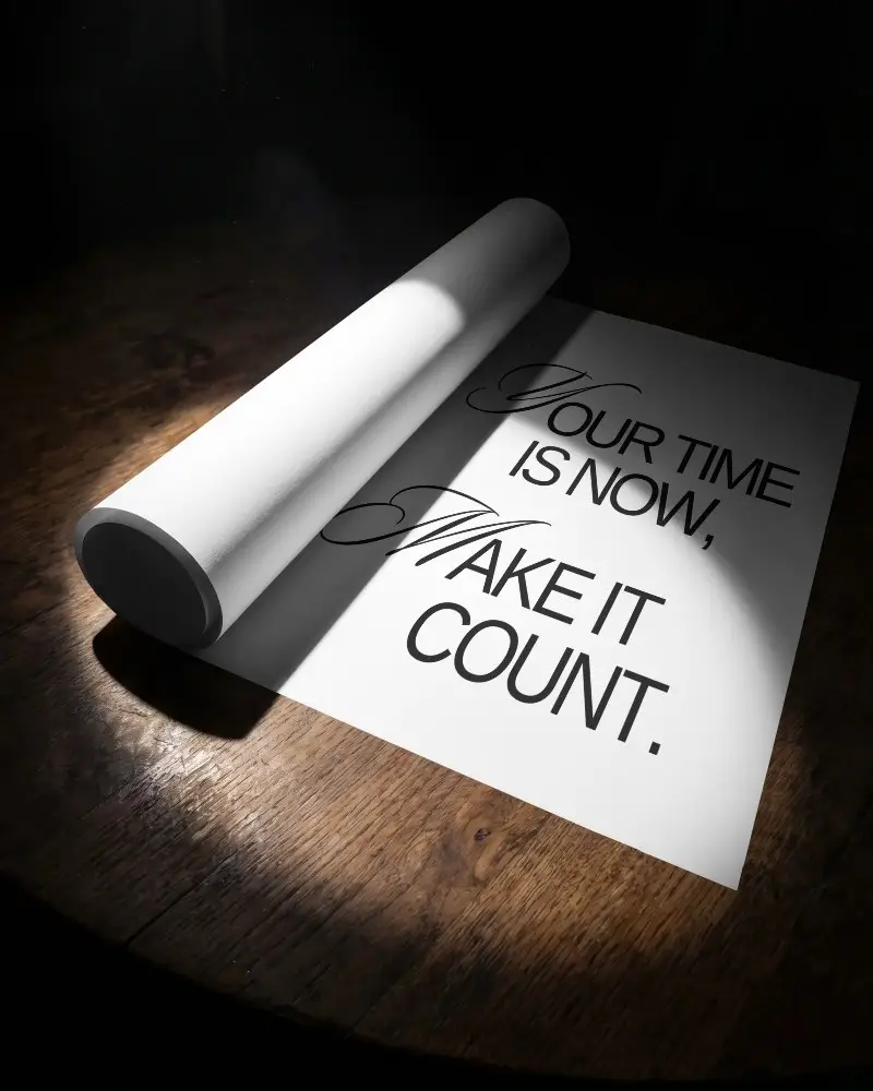 Rolled Poster Mockup On Wooden Surface With Focused Light And Dark Background Creative Display