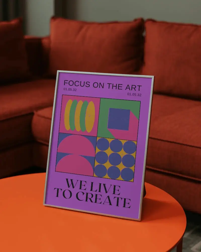Modern Poster Frame Mockup Standing On Round Table In Cozy Living Room Setting For Art Display