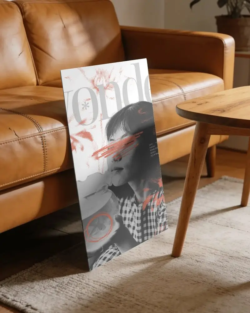 Modern Interior Poster Mockup Leaning Against Sofa Near Wooden Coffee Table