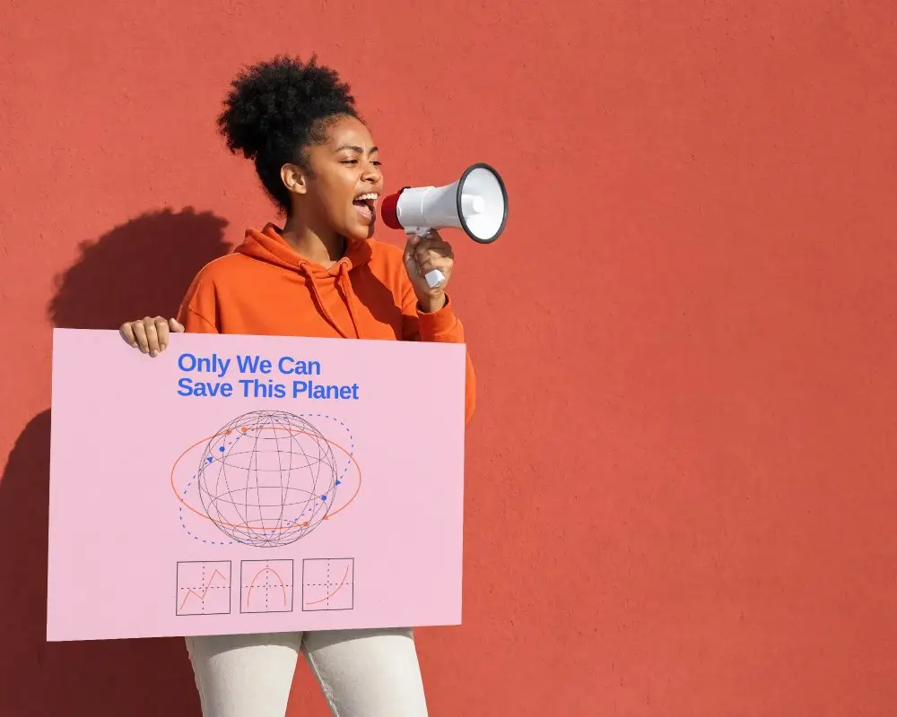 Activist Holding Large Poster Mockup Shouting Into Loudspeaker Isolated On Solid Color Wall