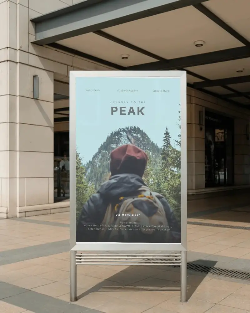 Freestanding Commercial Poster Mockup In Modern Shopping Complex With Clean Frame And Daylight