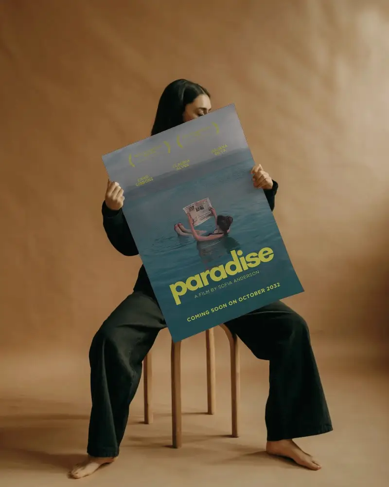 Seated Person Presenting Empty Poster Mockup Design Display Minimalist Setting