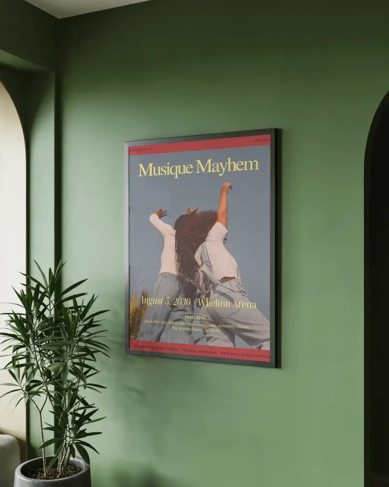 Minimalist Wall Poster Mockup On Textured Green Wall With Lush Potted Plant For Design Showcase