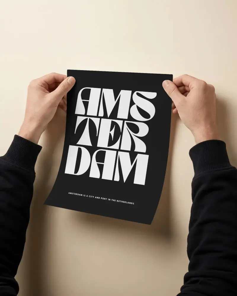 Person Presenting Poster Mockup With Both Hands In Clean Studio Setting