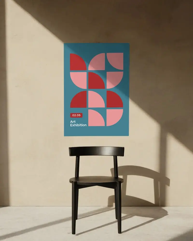 Vertical Poster Mockup On Textured Wall With Chair And Natural Light Shadow Effect
