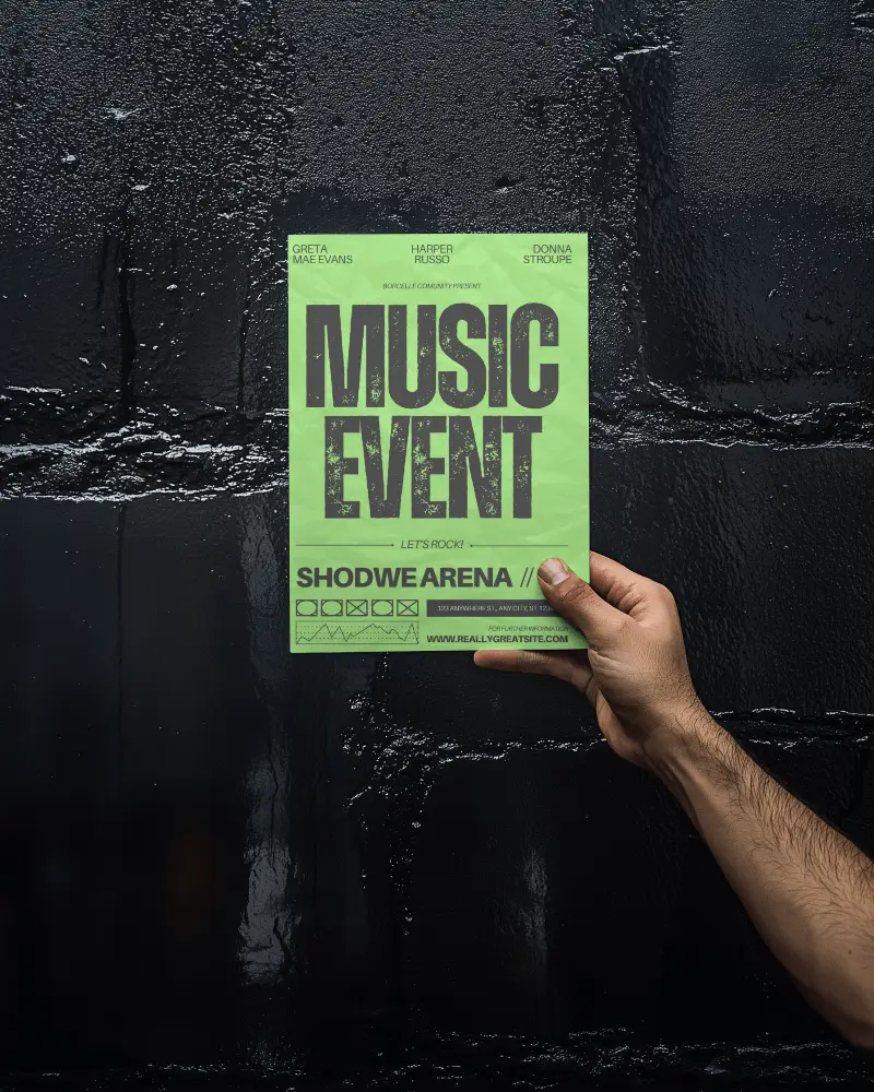 Hand Holding A4 Poster Mockup In Front Of Wet Black Brick Wall Urban Vibe Street Style Presentation For Event Promotions