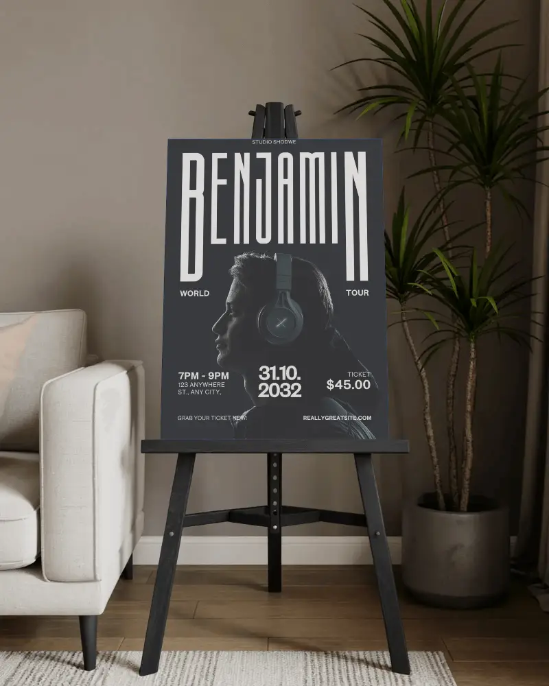 interior-room-poster-mockup-design-black-easel-floor-standing-next-to-sofa-and-plants