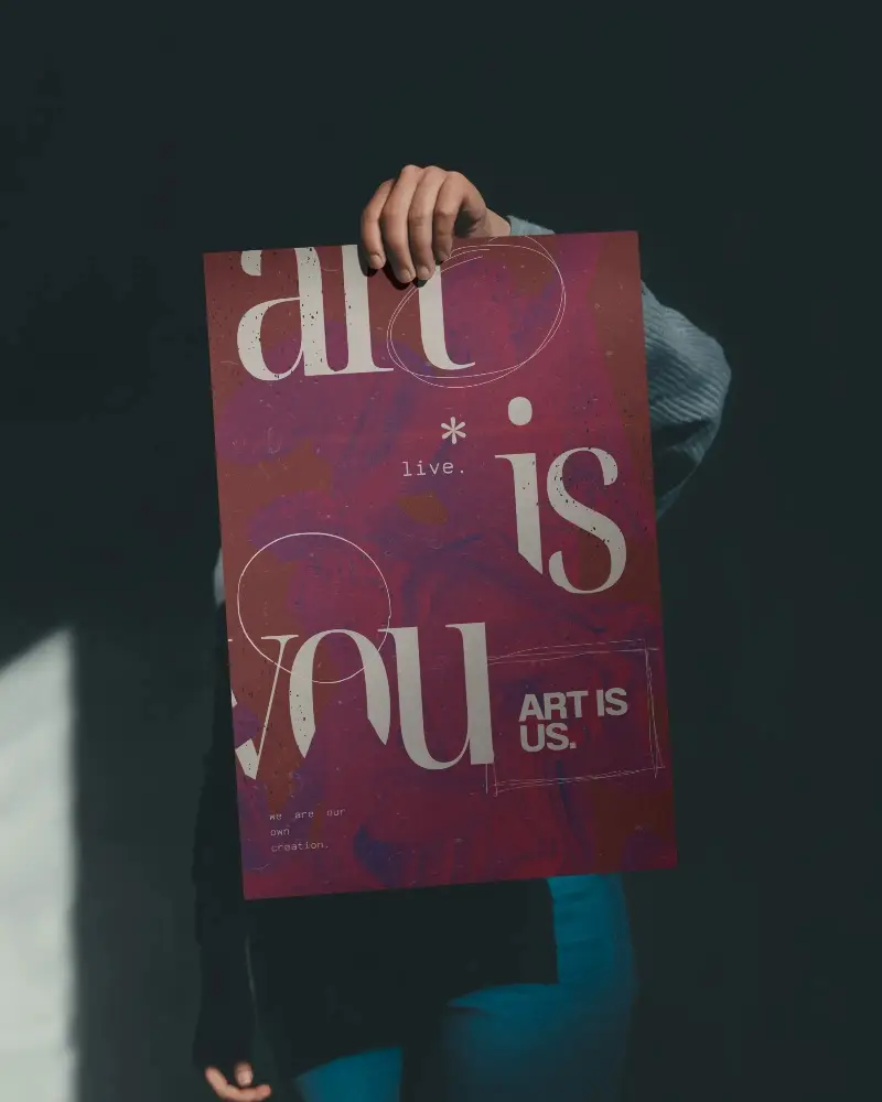 Person Displaying Blank Vertical Poster Mockup For Advertising Design