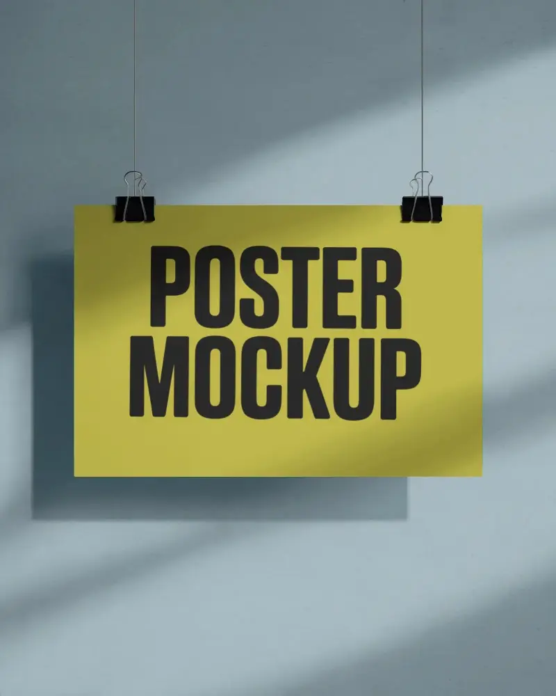 Hanging Poster Mockup On Textured Wall With Light Shadow Effect For Design