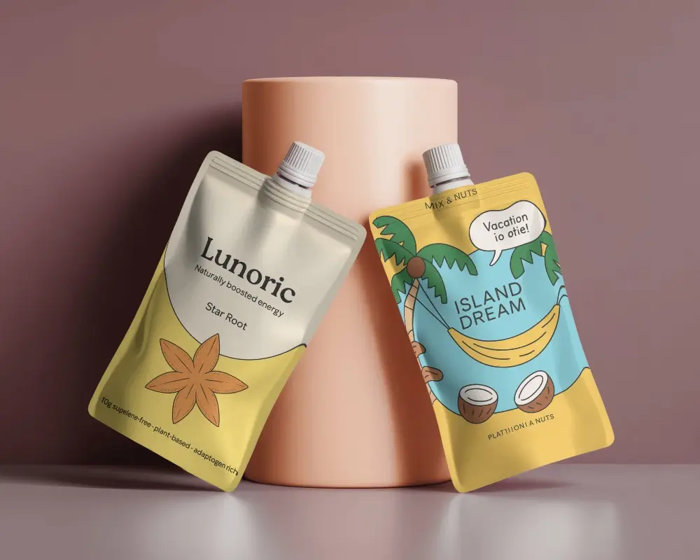 Dual Pouch Mockup Tilted Against Peach Cylinder In Pink Minimal Cosmetic Setting