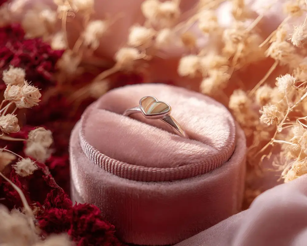 Beautiful Heart Motif Ring Mockup With Velvet Box And Natural Texture Elements For Promotions