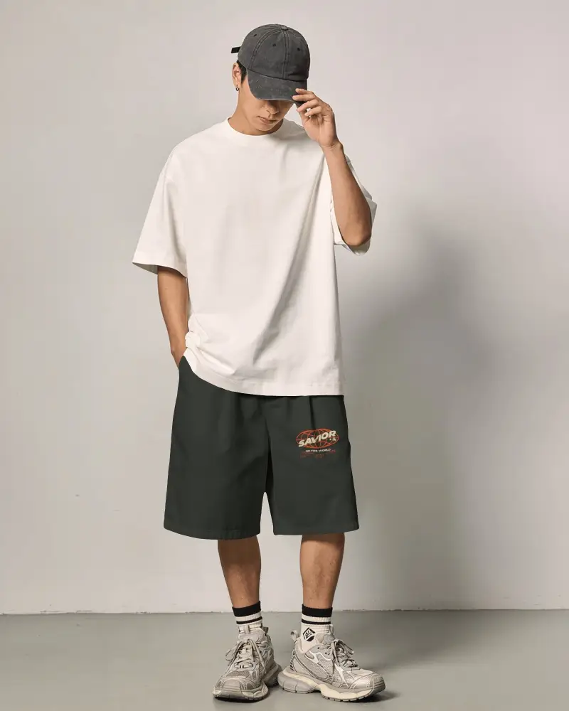 Minimal Studio Shorts Mockup Male Model Standing Relaxed Pose Neutral Background Soft Even Lighting