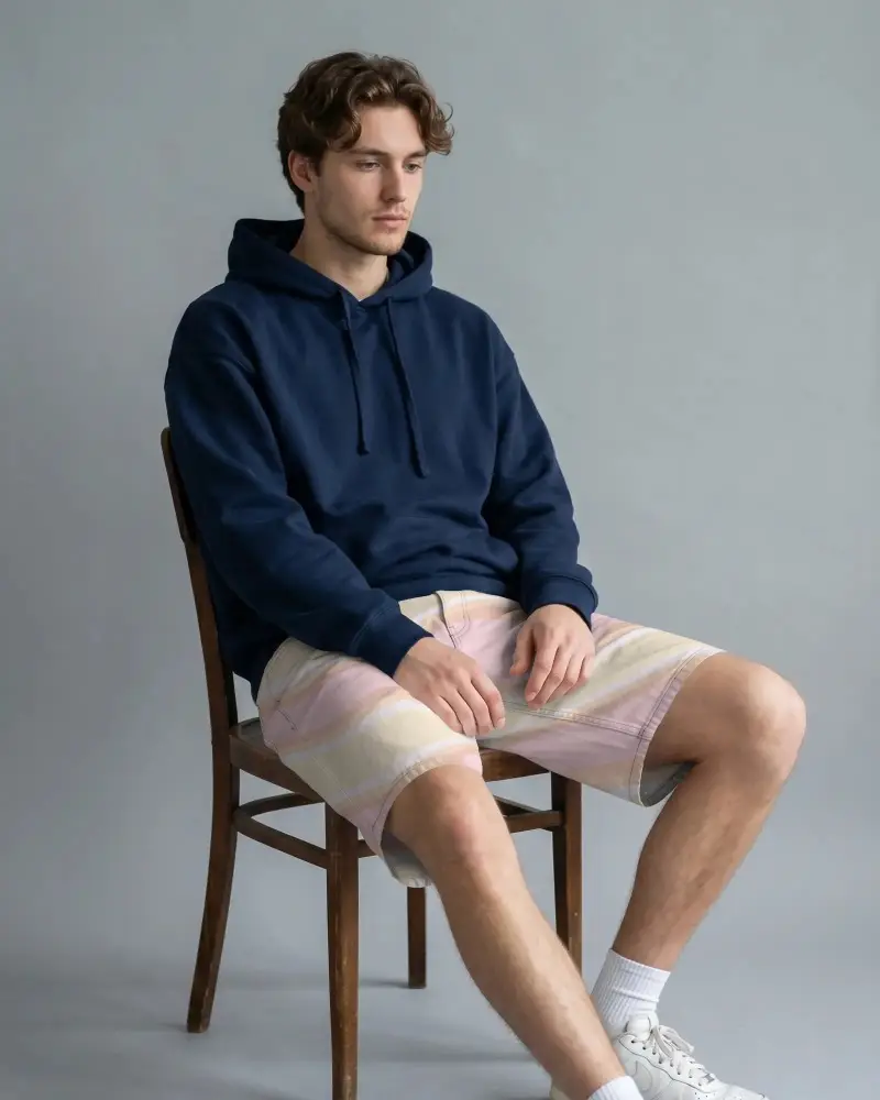Casual Comfortable Men Shorts Mockup Sitting On Wooden Chair For Fashion Display
