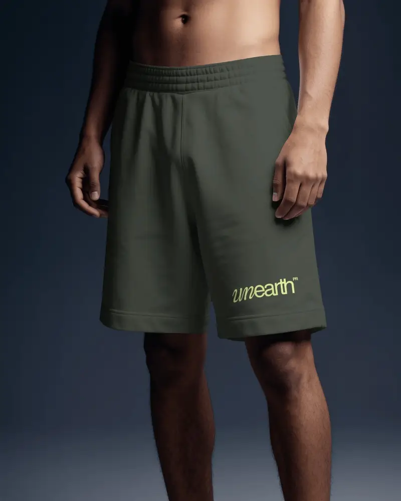 Realistic Mens Training Shorts Mockup With Muscular Model And Moody Background