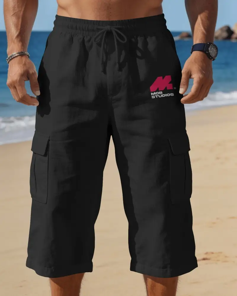 Mens Drawstring Cargo Capri Shorts Mockup On Male Model At Sunny Beach
