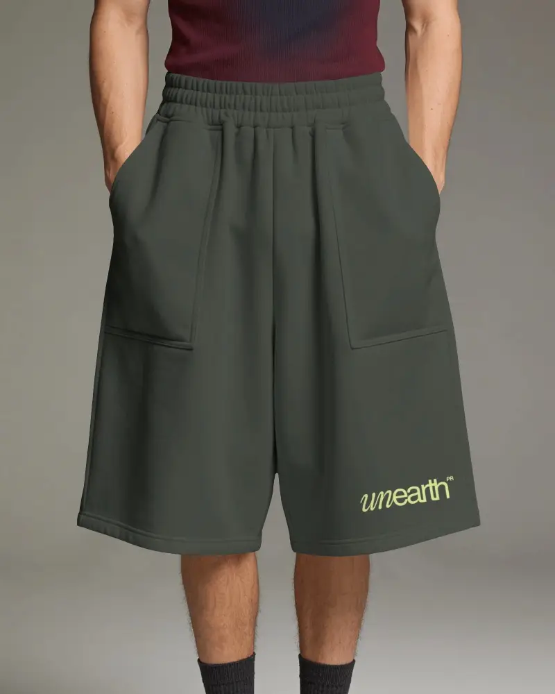 Male Model Baggy Sweat Shorts Mockup Front View With Large Patch Pockets