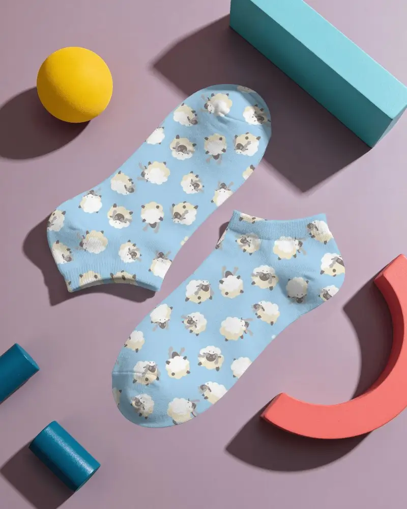 Flat Lay Low Cut Socks Mockup With Two Pairs Arranged Among Playful Geometric Props Studio Shadows