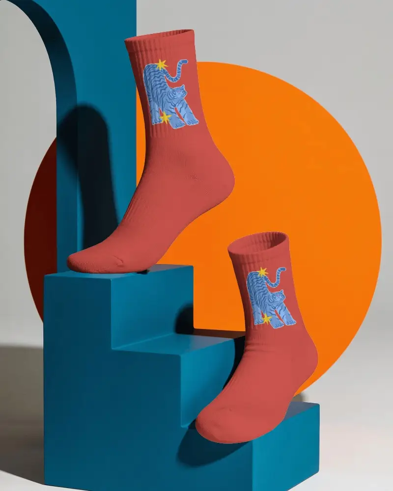 Architectural Crew Socks Mockup With Two Socks Posed On Sculptural Step Pedestal And Circular
