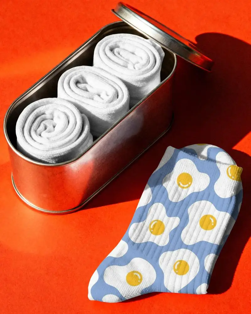 Cozy Durable Knit Cotton Kids Socks Mockup With Ribbed Cuffs In Easy To Carry Compact Tin Pack