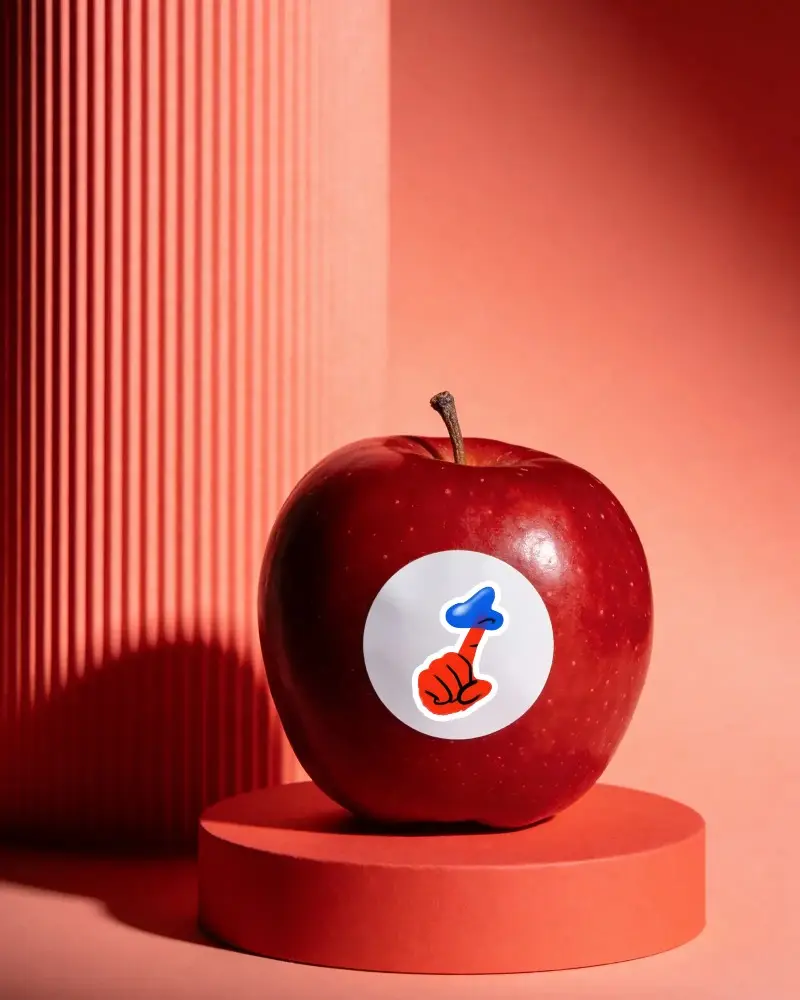 Round Sticker Mockup On Apple Fruit For Branding And Product Label Design Showcase