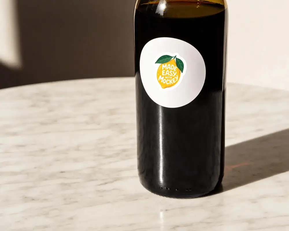Isolated Round Sticker Label Mockup On Wine Bottle For Logo And Packaging Presentation