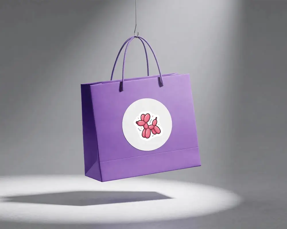 Blank Circular Sticker Mockup On Hanging Shopping Bag For Custom Branding And Promotional Use