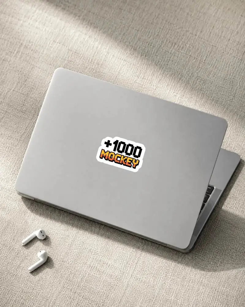 Professional Laptop Sticker Mockup Set On Neutral Textured Fabric For Presentation