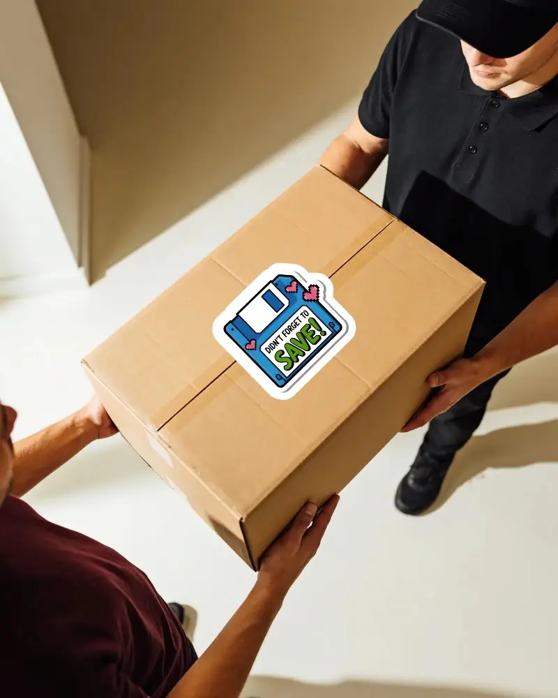 Id Shipping Box Sticker Mockup Handling Cardboard Package With Two Workers In Bright Workspace